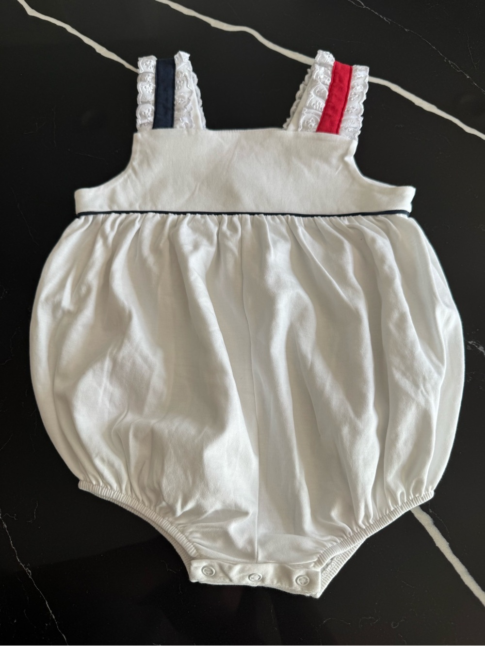 The Beaufort Bonnet Company White Baby Bubble Romper with Red and Navy Straps